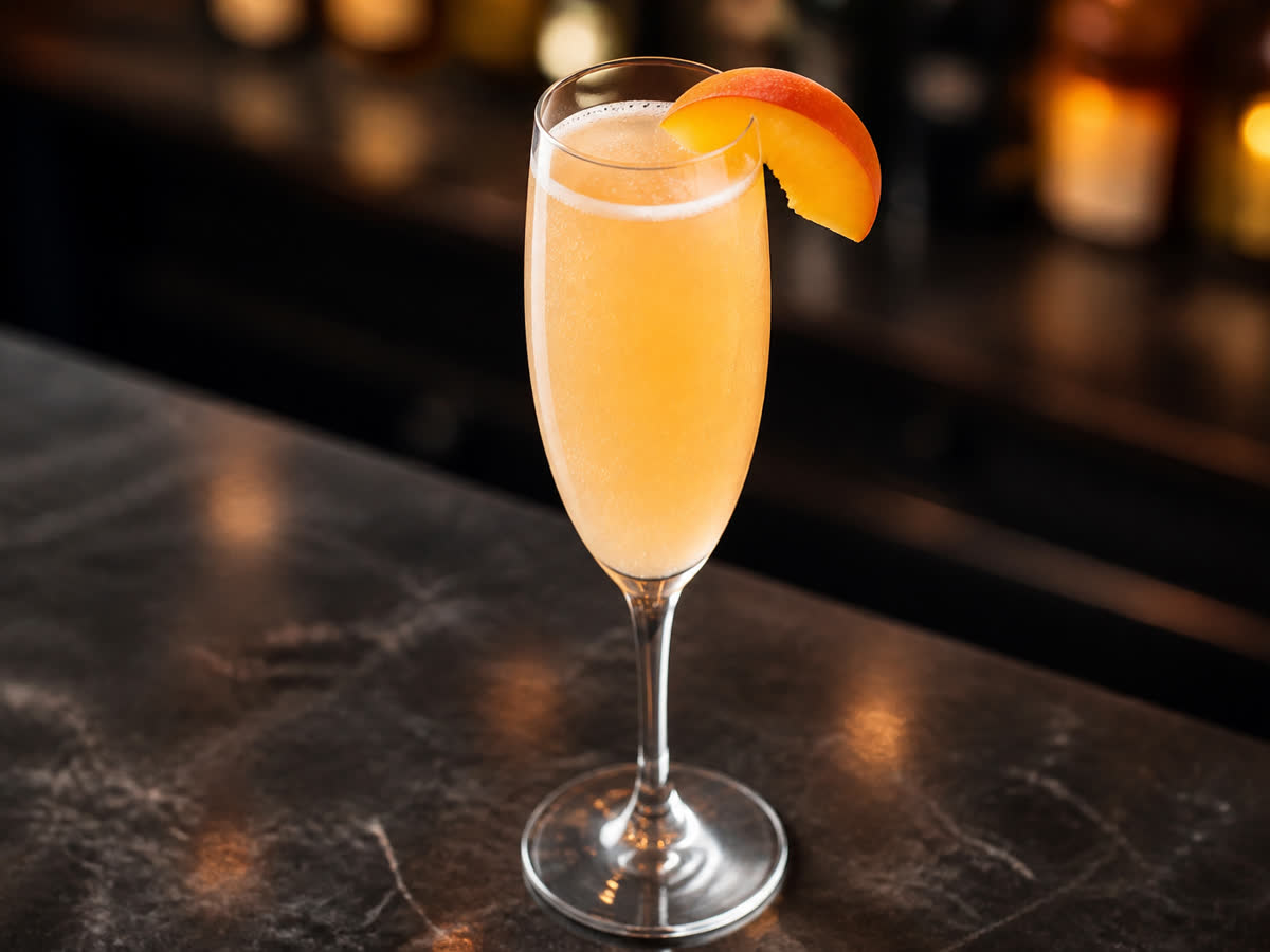 Bellini cocktail in a flute — Prosecco
