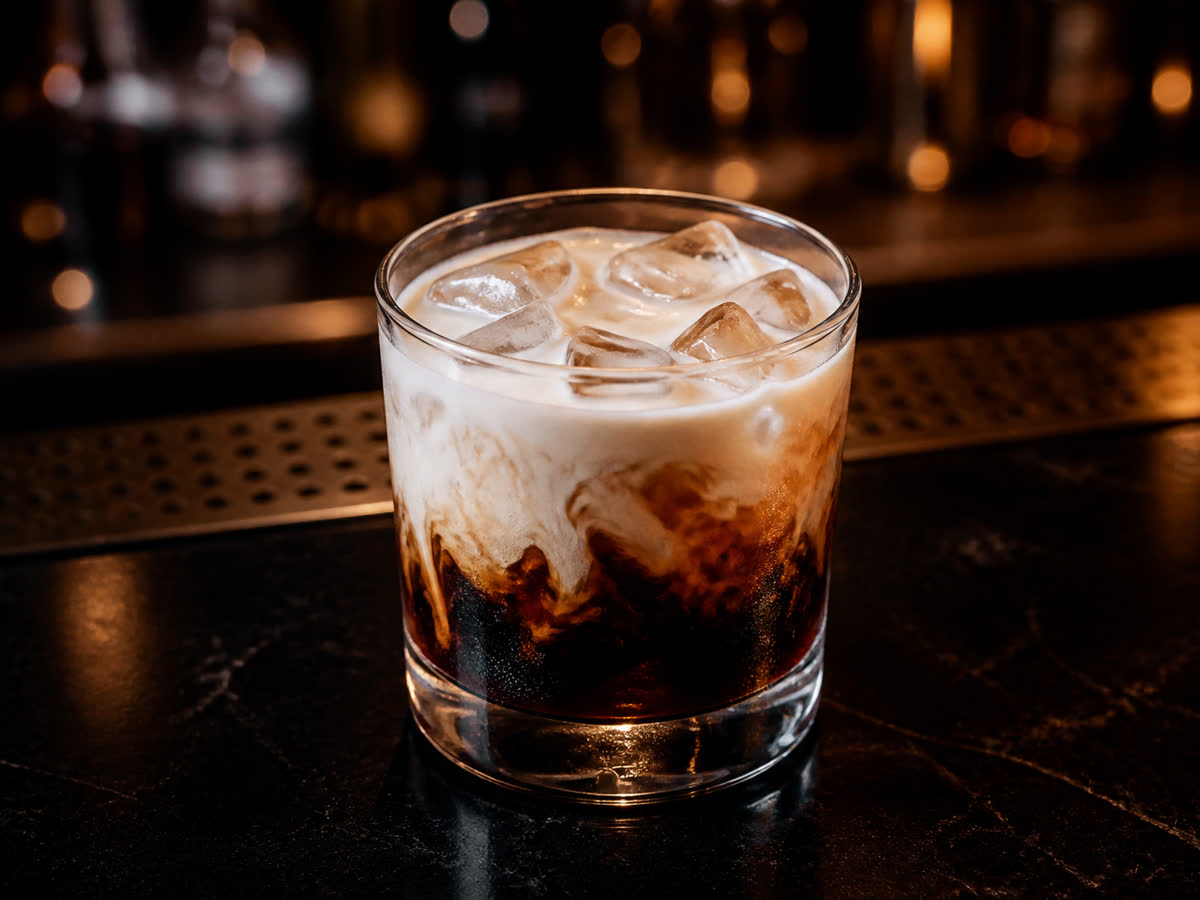 White Russian cocktail in a rocks glass — Heavy cream